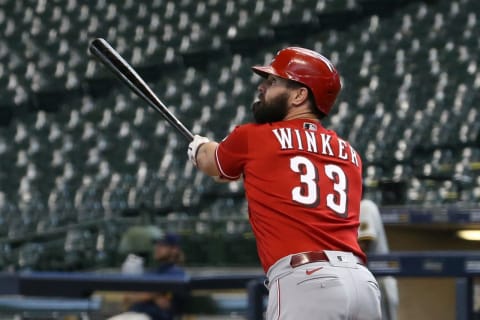 MILWAUKEE, WISCONSIN – AUGUST 27: Jesse Winker #33 of the Cincinnati Reds hits a home run in the fifth inning. (Photo by Dylan Buell/Getty Images)