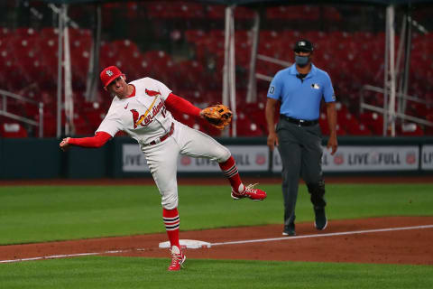 ST LOUIS, MO – AUGUST 20: Brad Miller #15 of the St. Louis Cardinals throws against the Cincinnati Reds. (Photo by Dilip Vishwanat/Getty Images)