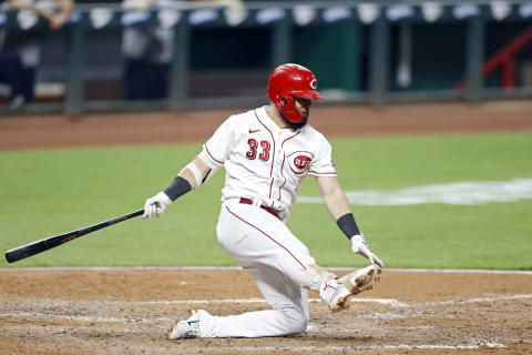 CINCINNATI, OH – SEPTEMBER 02: Jesse Winker #33 of the Cincinnati Reds falls after swinging and missing a pitch. (Photo by Joe Robbins/Getty Images)