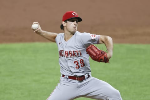 CLEVELAND, OH – AUGUST 05: Lucas Sims #39 of the Cincinnati Reds pitches. (Photo by Ron Schwane/Getty Images)