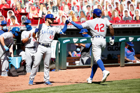 CINCINNATI, OH – AUGUST 30: Jason Heyward #42 of the Chicago Cubs is congratulated by David Bote #42 after hitting a home run during the game against the Cincinnati Reds at Great American Ball Park. (Photo by Kirk Irwin/Getty Images)