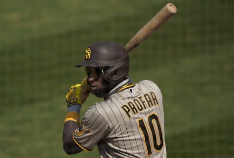 OAKLAND, CALIFORNIA – SEPTEMBER 06: Jurickson Profar #10 of the San Diego Padres warms up in the on-deck circle. (Photo by Thearon W. Henderson/Getty Images)