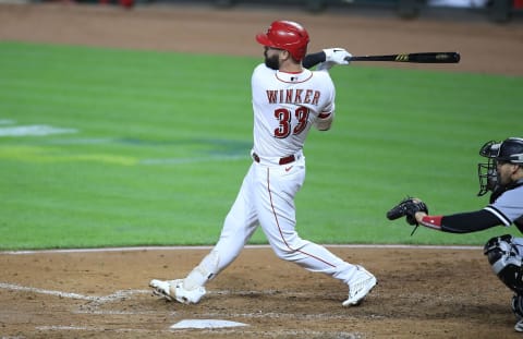 CINCINNATI, OHIO – SEPTEMBER 18: Jesse Winker #33 of the Cincinnati Reds hits a three run home run. (Photo by Andy Lyons/Getty Images)