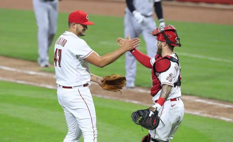 CINCINNATI, OHIO – SEPTEMBER 18: Sal Romano #47 of the Cincinnati Reds celebrates with Tucker Barnhart #16 after the 7-1 win. (Photo by Andy Lyons/Getty Images)