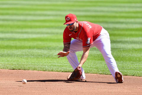 CINCINNATI, OH – SEPTEMBER 20: Mike Moustakas #9 of the Cincinnati Reds fields a ground ball against the Chicago White Sox. (Photo by Jamie Sabau/Getty Images)