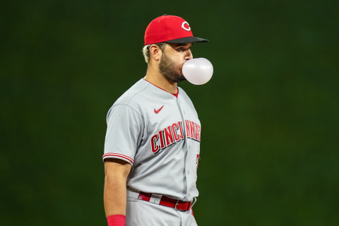 MINNEAPOLIS, MN – SEPTEMBER 25: Eugenio Suarez #7 of the Cincinnati Reds looks on and blows a bubble of gum. (Photo by Brace Hemmelgarn/Minnesota Twins/Getty Images)