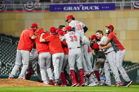 MINNEAPOLIS, MN – SEPTEMBER 25: The Cincinnati Reds celebrate after clinching a wild card spot in the postseason. (Photo by Brace Hemmelgarn/Minnesota Twins/Getty Images)