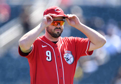 GOODYEAR, ARIZONA – MARCH 14: Mike Moustakas #9 of the Cincinnati Reds prepares for a spring training game. (Photo by Norm Hall/Getty Images)