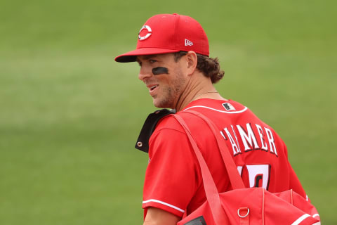 GLENDALE, ARIZONA – MARCH 25: Kyle Farmer #17 of the Cincinnati Reds looks on before the MLB spring training game. (Photo by Abbie Parr/Getty Images)