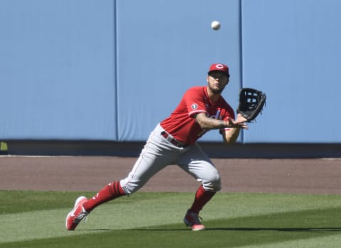 LOS ANGELES, CALIFORNIA – APRIL 28: Nick Senzel #15 of the Cincinnati Reds makes a catch for an out. (Photo by Harry How/Getty Images)