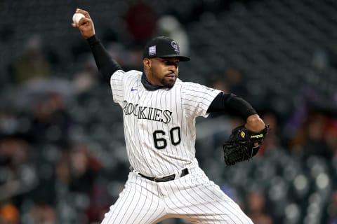 DENVER, COLORADO – MAY 04: Pitcher Mychal Givens #60 of the Colorado Rockies throws. (Photo by Matthew Stockman/Getty Images)