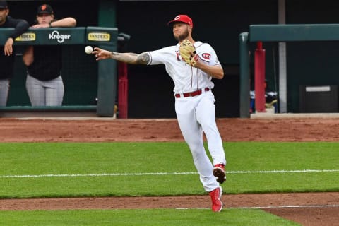 CINCINNATI, OH – MAY 17: Nick Senzel #15 of the Cincinnati Reds throws to first base. (Photo by Jamie Sabau/Getty Images)