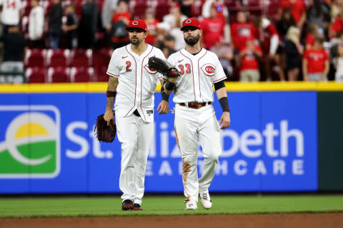 CINCINNATI, OHIO – JUNE 09: Nick Castellanos #2 and Jesse Winker #33 of the Cincinnati Reds celebrate. (Photo by Dylan Buell/Getty Images)