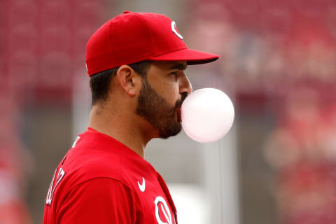 CINCINNATI, OH – JUNE 10: Eugenio Suarez #7 of the Cincinnati Reds blows a bubble while standing at third base. (Photo by Kirk Irwin/Getty Images)