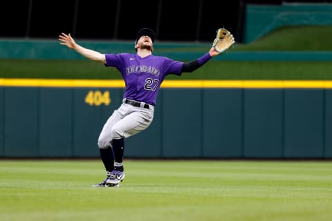 CINCINNATI, OH – JUNE 12: Trevor Story #27 of the Colorado Rockies fields a fly ball during the game against the Cincinnati Reds. (Photo by Kirk Irwin/Getty Images)