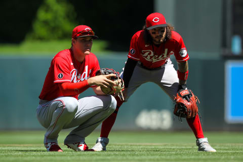 MINNEAPOLIS, MN – JUNE 22: Tyler Stephenson #37, left, talks to Jonathan India #6 while Tejay Antone #70 of the Cincinnati Reds warms up. (Photo by David Berding/Getty Images)