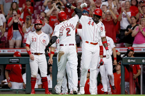 CINCINNATI, OHIO – JUNE 28: Nick Castellanos #2 and Aristides Aquino #44 of the Cincinnati Reds celebrate. (Photo by Dylan Buell/Getty Images)