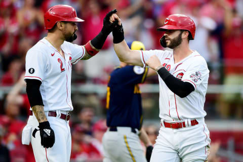 CINCINNATI, OHIO – JULY 16: Tyler Naquin #12 celebrates with Nick Castellanos #2 of the Cincinnati Reds. (Photo by Emilee Chinn/Getty Images)