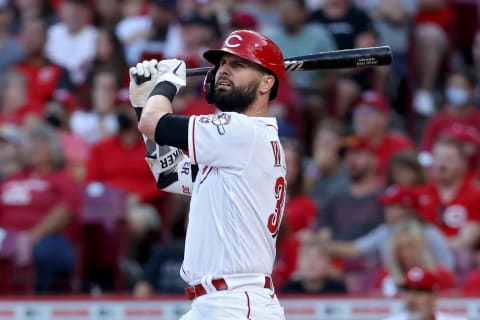 CINCINNATI, OHIO – AUGUST 03: Jesse Winker #33 of the Cincinnati Reds hits a double in the third inning. (Photo by Dylan Buell/Getty Images)