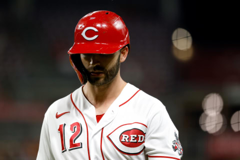 CINCINNATI, OH – AUGUST 05: Tyler Naquin #12 of the Cincinnati Reds walks back to the dugout. (Photo by Kirk Irwin/Getty Images)