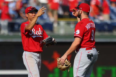 PHILADELPHIA, PA – AUGUST 15: Shogo Akiyama #4 and Mike Moustakas #9 of the Cincinnati Reds celebrate. (Photo by Rich Schultz/Getty Images)