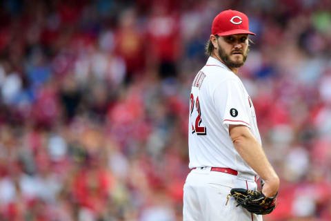 CINCINNATI, OHIO – AUGUST 21: Wade Miley #22 of the Cincinnati Reds eyes a runner. (Photo by Emilee Chinn/Getty Images)