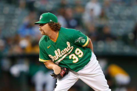 OAKLAND, CALIFORNIA – AUGUST 29: Andrew Chafin #39 of the Oakland Athletics pitches. (Photo by Lachlan Cunningham/Getty Images)