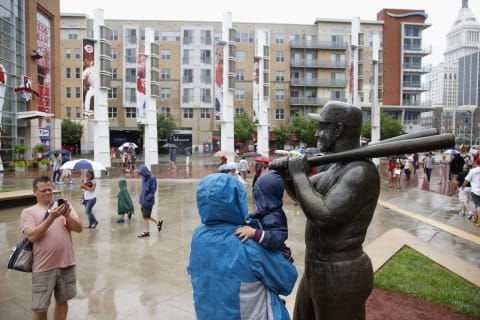 CINCINNATI, OH – JULY 4: Fans pose for photos next to a statue of former Cincinnati Reds great Ted Kluszewski. (Photo by Joe Robbins/Getty Images)