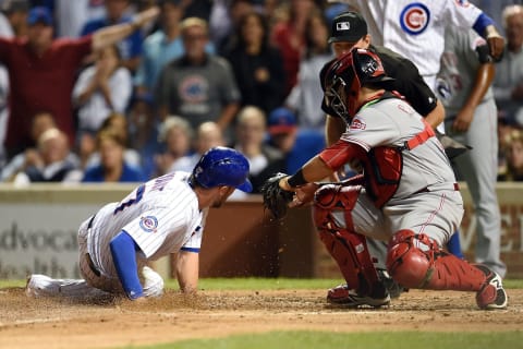 CHICAGO, IL – SEPTEMBER 20: Kris Bryant #17 of the Chicago Cubs scores during the fourth inning of a game against the Cincinnati Reds at Wrigley Field on September 20, 2016 in Chicago, Illinois. (Photo by Stacy Revere/Getty Images)