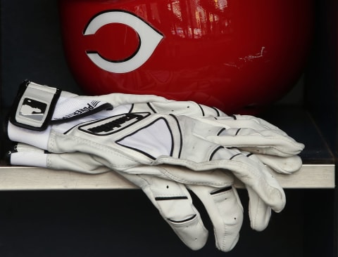 NEW YORK, NY – SEPTEMBER 07: A pair of Franklin batting gloves and a Cincinnati Reds batting helmet. (Photo by Rich Schultz/Getty Images)