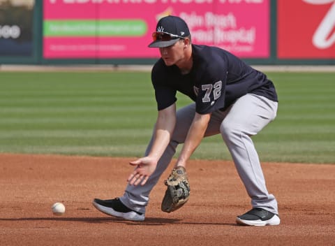 JUPITER, FL – MARCH 11: Kyle Holder #72 of the New York Yankees takes fielding practice. (Photo by Joel Auerbach/Getty Images)