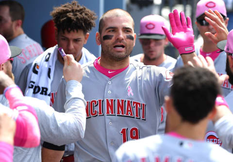 LOS ANGELES, CA – MAY 13: Joey Votto #19 of the Cincinnati Reds is greeted in the dugout after a two run home run in the sixth inning of the game against the Los Angeles Dodgers at Dodger Stadium on May 13, 2018 in Los Angeles, California. (Photo by Jayne Kamin-Oncea/Getty Images)