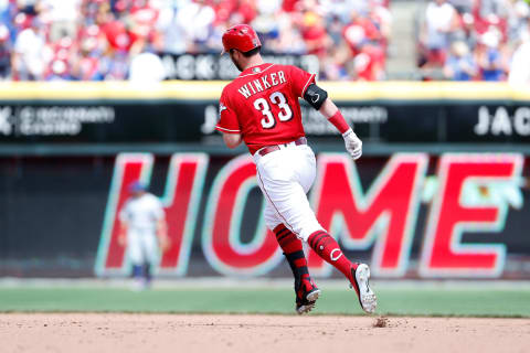 CINCINNATI, OH – JUNE 24: Jesse Winker #33 of the Cincinnati Reds rounds second base after hitting a three-run home run during the seventh inning of the game against the Chicago Cubs at Great American Ball Park on June 24, 2018 in Cincinnati, Ohio. Cincinnati defeated Chicago 8-6. (Photo by Kirk Irwin/Getty Images)