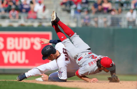 MINNEAPOLIS, MN – APRIL 29: Alex Blandino #2 of the Cincinnati Reds turns the double play on Joe Mauer #7 of the Minnesota Twins in the eighth inning at Target Field on April 29, 2018 in Minneapolis, Minnesota. (Photo by Adam Bettcher/Getty Images)