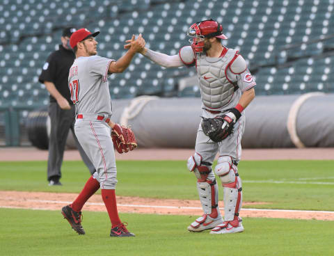 DETROIT, MI – AUGUST 02: Trevor Bauer #27 (L) and Curt Casali #12 of the Cincinnati Reds shake hands after the victory.(Photo by Mark Cunningham/MLB Photos via Getty Images)