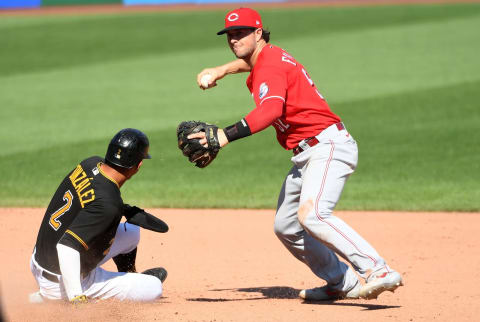 PITTSBURGH, PA – SEPTEMBER 06: Kyle Farmer #52 of the Cincinnati Reds cannot turn the second half of a double play in the eighth inning. (Photo by Justin Berl/Getty Images)