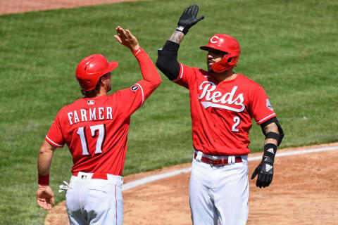 CINCINNATI, OH – APRIL 4: Kyle Farmer #17 of the Cincinnati Reds congratulates Nick Castellanos #2 after Castellanos hit a three-run home run in the fifth inning. (Photo by Jamie Sabau/Getty Images)