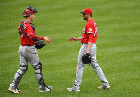 PITTSBURGH, PA – MAY 12: Tyler Stephenson #37 of the Cincinnati Reds celebrates with Heath Hembree #55 after a 5-1 win. (Photo by Joe Sargent/Getty Images)