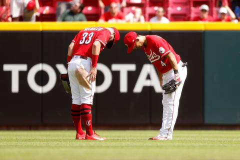 CINCINNATI, OH – JUNE 13: Jesse Winker #33 of the Cincinnati Reds and Shogo Akiyama #4 bow to each other. (Photo by Kirk Irwin/Getty Images)