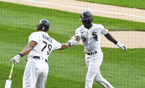 CHICAGO, ILLINOIS – AUGUST 18: Tim Anderson #7 and Jose Abreu #79 of the Chicago White Sox celebrate. (Photo by David Banks/Getty Images)