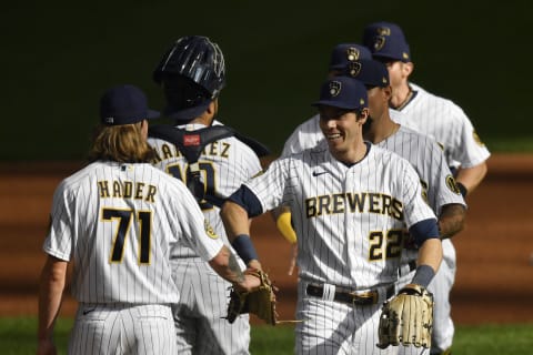 MILWAUKEE, WISCONSIN – SEPTEMBER 20: Christian Yelich #22 of the Milwaukee Brewers celebrates the team win against the Kansas City Royals. (Photo by Quinn Harris/Getty Images)