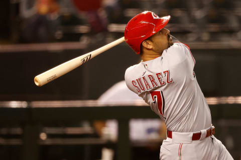 PHOENIX, ARIZONA – APRIL 09: Eugenio Suarez #7 of the Cincinnati Reds hits a sacrifice fly. (Photo by Christian Petersen/Getty Images)