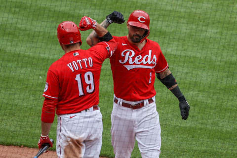 CINCINNATI, OHIO – MAY 02: Joey Votto #19 and Nick Castellanos #2 of the Cincinnati Reds celebrate after Castellanos hit a home run. (Photo by Dylan Buell/Getty Images)