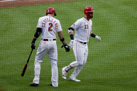 CINCINNATI, OHIO – MAY 21: Nick Castellanos #2 and Jesse Winker #33 of the Cincinnati Reds celebrate after Winker hit a home run in the third inning. (Photo by Dylan Buell/Getty Images)