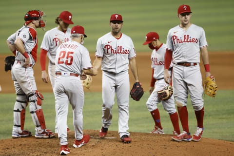 MIAMI, FLORIDA – MAY 24: Brandon Kintzler #19 of the Philadelphia Phillies hands the ball to manager Joe Girardi #25 as he is taken out of the game. (Photo by Michael Reaves/Getty Images)