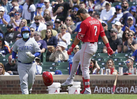 CHICAGO, ILLINOIS – MAY 30: Eugenio Suarez, #7 of the Cincinnati Reds, kicks his helmet after his fly out during the fifth inning. (Photo by Nuccio DiNuzzo/Getty Images)