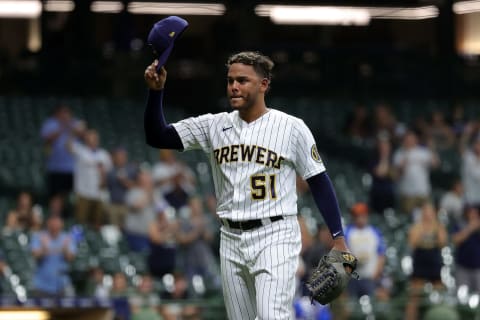 MILWAUKEE, WISCONSIN – JUNE 04: Freddy Peralta #51 of the Milwaukee Brewers waves to the crowd after coming out of the game. (Photo by Stacy Revere/Getty Images)