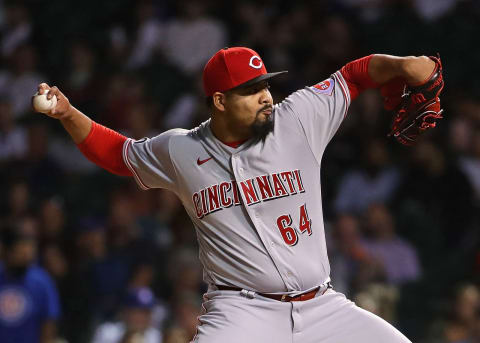 CHICAGO, ILLINOIS – SEPTEMBER 08: Tony Santillan #64 of the Cincinnati Reds pitches. (Photo by Jonathan Daniel/Getty Images)