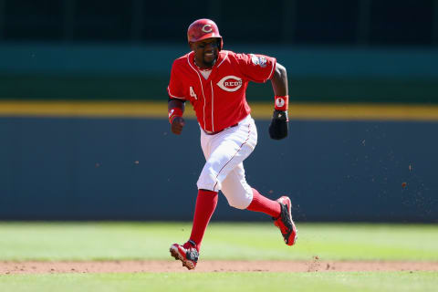 CINCINNATI, OH – SEPTEMBER 25: Brandon Phillips #4 of the Cincinnati Reds runs to third base during the game against the Milwaukee Brewersat Great American Ball Park on September 25, 2014 in Cincinnati, Ohio. (Photo by Andy Lyons/Getty Images)