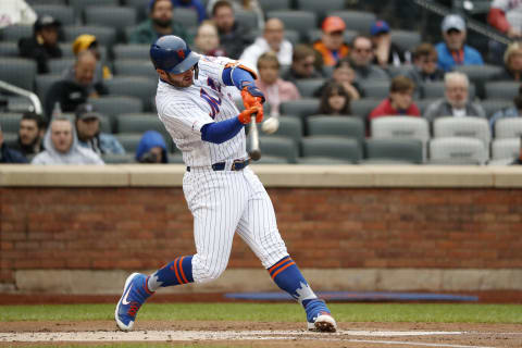 NEW YORK, NEW YORK – APRIL 28: Pete Alonso #20 of the New York Mets hits a triple to left field during the first inning against the Milwaukee Brewers at Citi Field on April 28, 2019 in the Flushing neighborhood of the Queens borough of New York City. (Photo by Michael Owens/Getty Images)